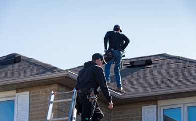 A roofing crew working on a home in Texas.