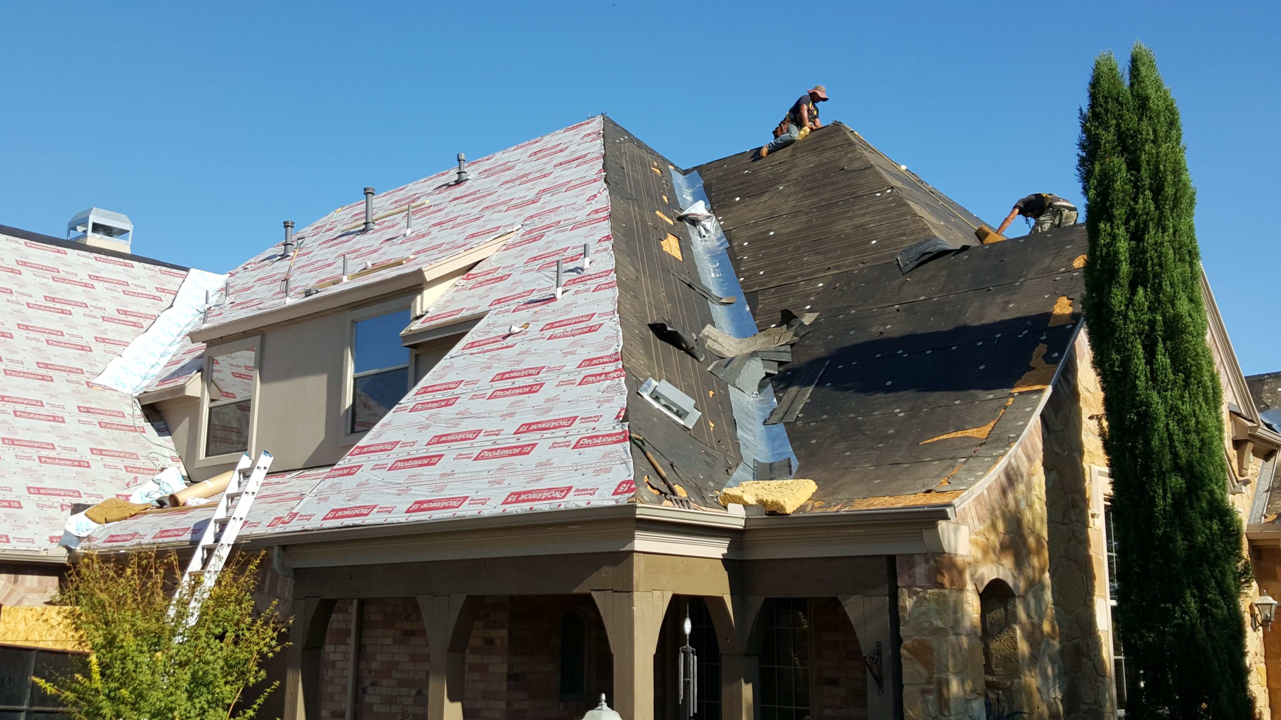 A TAG Roofing & Exteriors crew installing a new roof on a home in Austin, Texas.