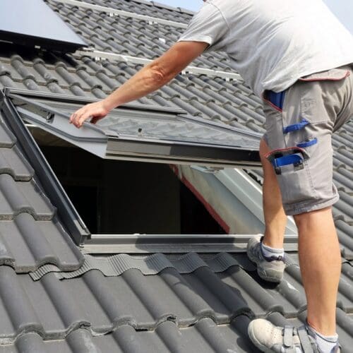 Worker installing a brand new skylight